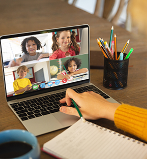 Teacher connecting with students in her online interactive classroom